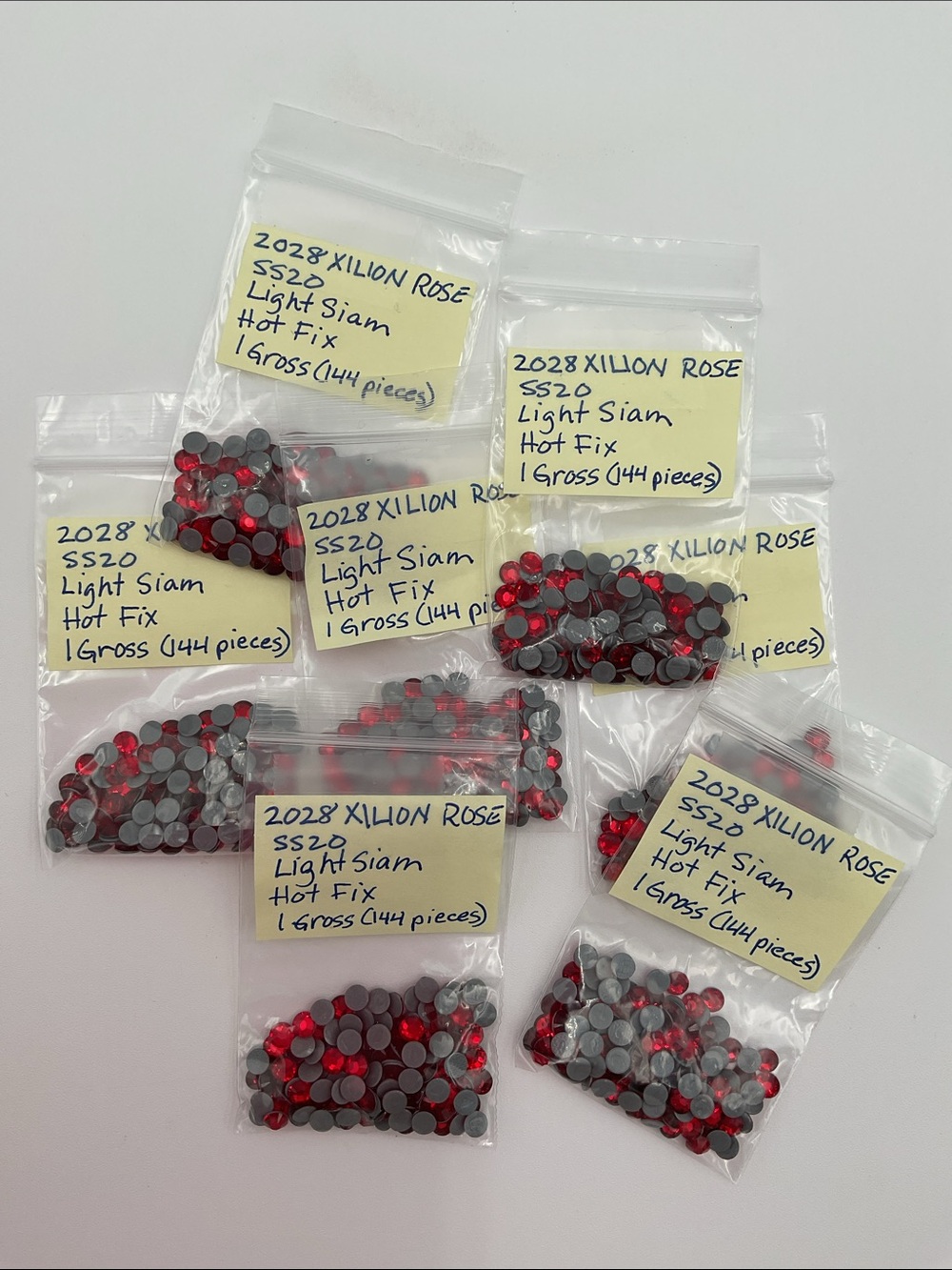 Swarovski • Color: Light Siam, 2028 XILION Rose Hotfix Rhinestones